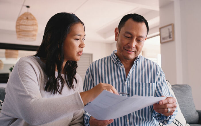 couple looking over paperwork